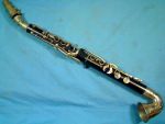Saxonette A rare Albert System Clarinet by Gretsch shaped like a Saxophone. 4 rings, 4 rollers, Curved octave key, composition. No Serial number..jpg