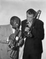 Louis Armstrong and James Stewart in the Glen Miller story.jpg